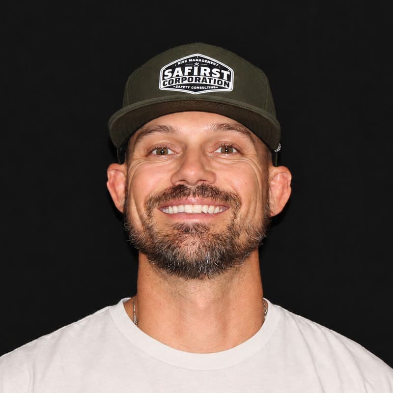 Headshot of Brandon Glenn, owner of Safirst, in a Safirst Corporation cap
