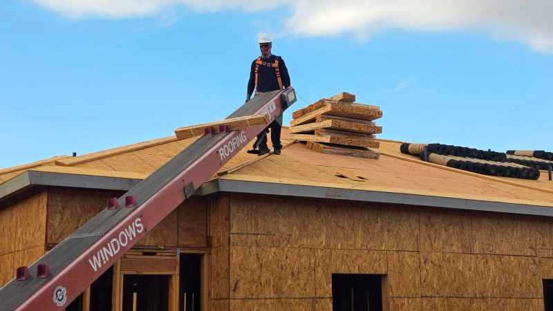 Fall protection (guardrail, PFAS, or safety net) in place at ALL unprotected edges 6 ft or more above lower level